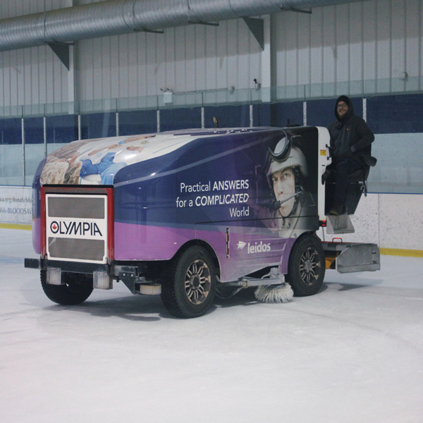 machine cleaning ice rink